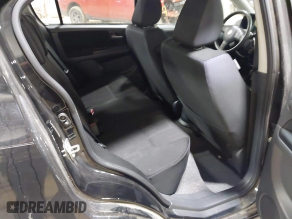 2010 Suzuki SX4 with VIN JS2YC5A40A6300005, listed as a IAAI auction lot 41810017 with 101,896 mi miles and . Bid and sale history available at DreamBid. Image 8.
