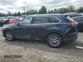 2019 Mazda CX-9 Touring with VIN JM3TCACY8K0312296, listed as a Copart auction lot 58550155 with 87,363 mi miles and Salvage title. Bid and sale history available at DreamBid. Image 2.