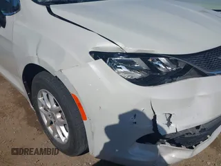 2017 Chrysler Pacifica Touring with VIN 2C4RC1DG6HR633826, listed as a IAAI auction lot 42170041 with 143,481 mi miles and . Bid and sale history available at DreamBid. Image 6.
