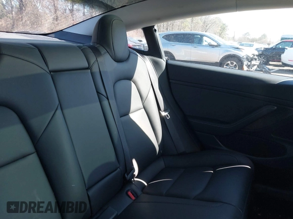 2020 Tesla Model 3 Standard Range Plus with VIN 5YJ3E1EA0LF783672, listed as a IAAI auction lot 41903431 with 52,157 mi miles and . Bid and sale history available at carsss.com. Image 8.