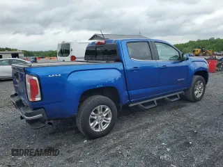 2019 GMC Canyon 4WD SLE z VIN 1GTG6CEN1K1206640, wystawiony jako Copart lot #55339285 z przebiegiem 52 166 mil mil oraz Szkody całkowita. Historia ofert i sprzedaży dostępna na DreamBid. Obrazek 3.