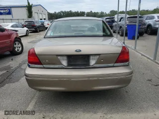 2005 Ford Crown Victoria LX with VIN 2FAFP74W95X126417, listed as a Copart auction lot 73537004 with 246,163 mi miles and Salvage Title. Bid and sale history available at carsss.com. Image 6.