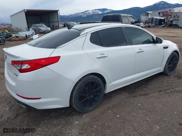 2013 Kia Optima SX w/Limited Pkg with VIN 5XXGR4A62DG249628, listed as a IAAI auction lot 41899068 with 125,947 mi miles. Bid and sale history available at carsss.com. Image 4.