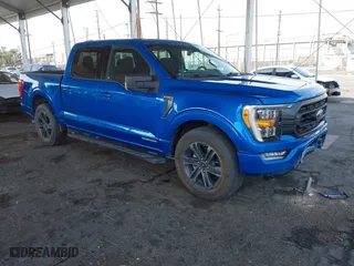 2021 Ford F-150 XL with VIN 1FTFW1CD0MFC50953, listed as a IAAI auction lot 41466036 with 33,983 mi miles. Bid and sale history available at carsss.com. Image 1.