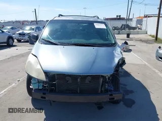 2010 Toyota Sienna CE with VIN 5TDKK4CCXAS332266, listed as a IAAI auction lot 41809577 with 217,051 mi miles. Bid and sale history available at carsss.com. Image 13.