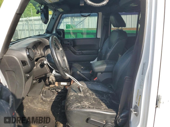 2014 Jeep Wrangler Unlimited Sahara с VIN 1C4BJWEG1EL322781, выставлен на аукционе Copart как лот 64200145 с пробегом 119 500 миль миль и Чистый • Clean title. История ставок и продаж доступна на DreamBid. Изображение 7.