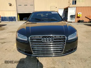 2016 Audi A8 3.0T z VIN WAU34AFD5GN013080, wystawiony jako Copart lot #60356355 z przebiegiem 134 580 mil mil oraz Czysty tytuł • Clean title. Historia ofert i sprzedaży dostępna na DreamBid. Obrazek 5.