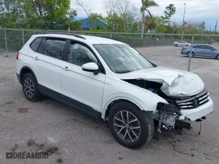 2021 Volkswagen Tiguan S with VIN 3VV1B7AX9MM119690, listed as a IAAI auction lot 41352383 with 27,149 mi miles. Bid and sale history available at carsss.com. Image 1.