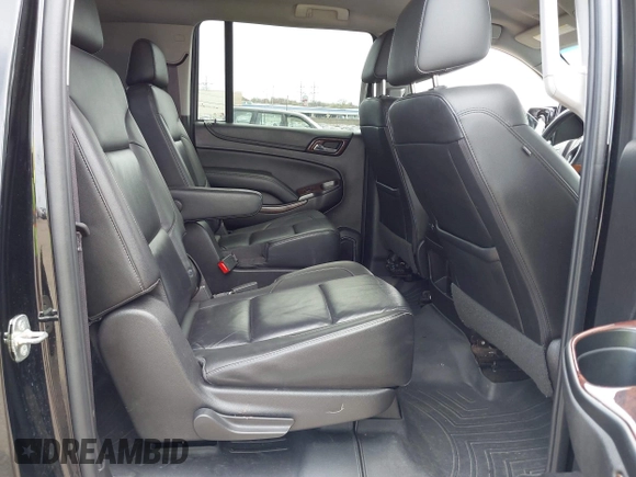 2017 Chevrolet Suburban LT with VIN 1GNSKHKCXHR194365, listed as a IAAI auction lot 42060690 with 213,424 mi miles and . Bid and sale history available at DreamBid. Image 8.
