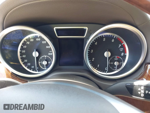 2014 Mercedes-Benz GL 450 with VIN 4JGDF7CE3EA336481, listed as a IAAI auction lot 42647526 with 145,311 mi miles and . Bid and sale history available at DreamBid. Image 7.