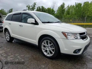 2013 Dodge Journey Crew with VIN 3C4PDCDG9DT537552, listed as a Copart auction lot 58126615 with 96,884 mi miles and Salvage title. Bid and sale history available at DreamBid. Image 4.
