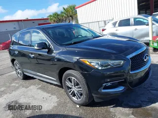 2020 Infiniti QX60 Pure with VIN 5N1DL0MNXLC532367, listed as a IAAI auction lot 41665315 with 141,628 mi miles and . Bid and sale history available at DreamBid. Image 1.