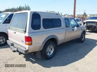 1997 Ford Ranger XLT with VIN 1FTCR15X0VPA25106, listed as a IAAI auction lot 42061204 with 173,022 mi miles. Bid and sale history available at carsss.com. Image 4.