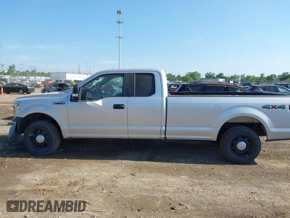 2018 Ford F-150 XL with VIN 1FTFX1EG1JKD86371, listed as a IAAI auction lot 42617305 with 212,187 mi miles and . Bid and sale history available at DreamBid. Image 14.