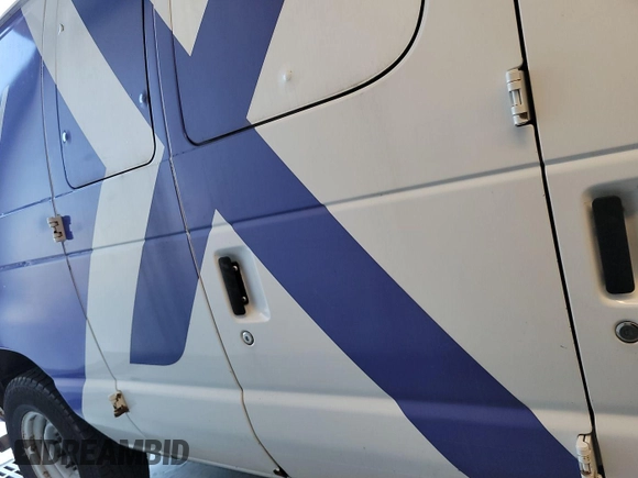 2012 Ford Econoline Cargo Commercial with VIN 1FTNE2EL9CDB21032, listed as a IAAI auction lot 42787135 with 106,406 mi miles and . Bid and sale history available at DreamBid. Image 43.