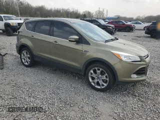 2013 Ford Escape SEL with VIN 1FMCU9H96DUA72579, listed as a Copart auction lot 49323715 with 155,530 mi miles and Salvage Title. Bid and sale history available at DreamBid. Image 4.
