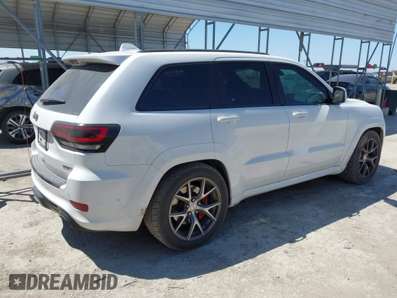 2017 Jeep Grand Cherokee SRT with VIN 1C4RJFDJ0HC699537, listed as a IAAI auction lot 41781500 with 105,640 mi miles. Bid and sale history available at carsss.com. Image 4.