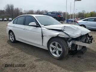 2015 BMW 3 Series 328i xDrive with VIN WBA3B5C53FF960590, listed as a Copart auction lot 54687145 with 54,520 mi miles and Salvage title. Bid and sale history available at DreamBid. Image 4.