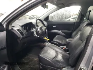 2010 Mitsubishi Outlander XLS z VIN JA4JT4AX9AZ002688, wystawiony jako Copart lot #51173605 z przebiegiem 162 147 mil mil oraz Szkoda całkowita • Salvage title. Historia ofert i sprzedaży dostępna na DreamBid. Obrazek 7.