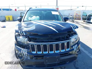 2016 Jeep Compass Latitude with VIN 1C4NJCEB2GD628384, listed as a IAAI auction lot 41752694 with 122,589 mi miles. Bid and sale history available at carsss.com. Image 6.