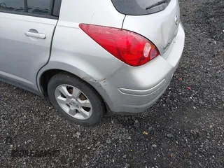 2008 Nissan Versa 1.8 S with VIN 3N1BC13EX8L369608, listed as a IAAI auction lot 42046943 with 133,826 mi miles. Bid and sale history available at carsss.com. Image 14.