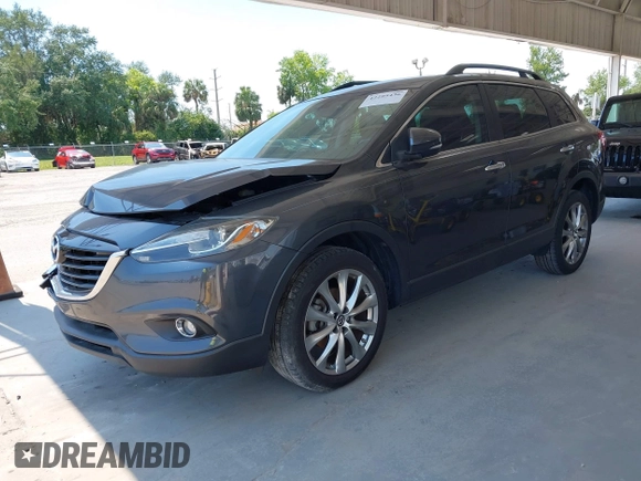 2014 Mazda CX-9 Grand Touring z VIN JM3TB2DA0E0434181, wystawiony jako IAAI lot #42295436 z przebiegiem 78 372 mil mil oraz . Historia ofert i sprzedaży dostępna na DreamBid. Obrazek 17.