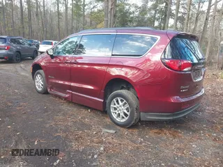 2021 Chrysler Voyager LXi with VIN 2C4RC1DG1MR556020, listed as a IAAI auction lot 41044760 with 6,286 mi miles and . Bid and sale history available at DreamBid. Image 3.
