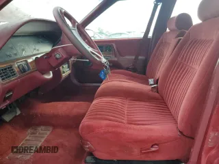 1990 Pontiac Bonneville z VIN 1G2HX54C7L1244134, wystawiony jako Copart lot #77859884 z przebiegiem 104 905 mil mil oraz Czysty tytuł • Clean title. Historia ofert i sprzedaży dostępna na DreamBid. Obrazek 7.