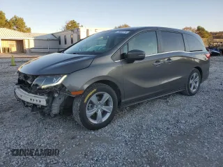 2018 Honda Odyssey EX-L z VIN 5FNRL6H72JB013113, wystawiony jako Copart lot #79555174 z przebiegiem 147 718 mil mil oraz Szkody całkowita. Historia ofert i sprzedaży dostępna na DreamBid. Obrazek 1.