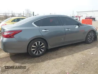 2018 Nissan Altima SR with VIN 1N4AL3AP1JC115513, listed as a IAAI auction lot 41939090 with 118,215 mi miles and . Bid and sale history available at DreamBid. Image 13.