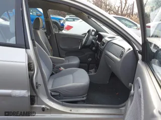 2001 Kia Rio with VIN KNADC123716042067, listed as a IAAI auction lot 41449479 with 113,108 mi miles. Bid and sale history available at carsss.com. Image 5.