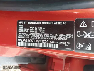 2015 BMW X1 xDrive28i with VIN WBAVL1C50FVY41206, listed as a IAAI auction lot 41508136 with 102,725 mi miles. Bid and sale history available at carsss.com. Image 9.