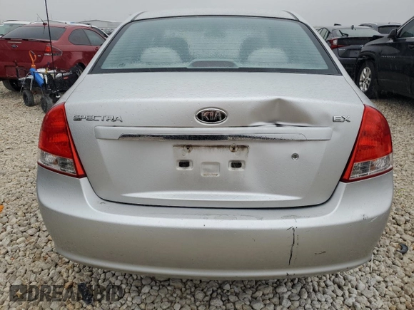 2009 Kia Spectra SX with VIN KNAFE221195656606, listed as a Copart auction lot 84694524 with Not Provided miles and Salvage Title. Bid and sale history available at carsss.com. Image 6.
