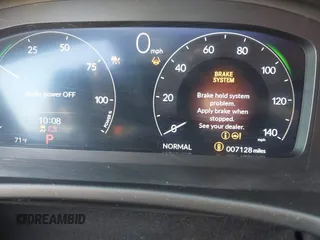 2025 Honda Civic Sport Touring z VIN 19XFL4H94SE000539, wystawiony jako IAAI lot #41777545 z przebiegiem 7 128 mil mil oraz . Historia ofert i sprzedaży dostępna na DreamBid. Obrazek 15.