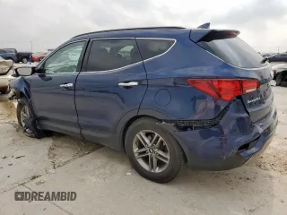 2017 Hyundai Santa Fe 2.4L z VIN 5XYZU3LB4HG401163, wystawiony jako Copart lot #57504375 z przebiegiem 84 964 mil mil oraz Szkoda całkowita • Salvage title. Historia ofert i sprzedaży dostępna na DreamBid. Obrazek 2.