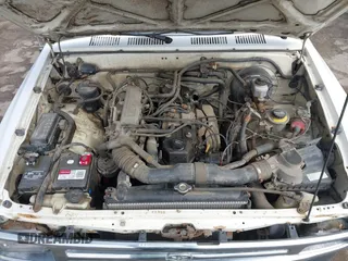 1992 Toyota Pickup DLX z VIN 4TARN81PXNZ004395, wystawiony jako IAAI lot #41729264 z przebiegiem 137 289 mil mil oraz . Historia ofert i sprzedaży dostępna na DreamBid. Obrazek 10.