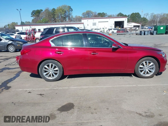 2015 Infiniti Q50 z VIN JN1BV7AR6FM420284, wystawiony jako IAAI lot #41795605 z przebiegiem 160 353 mil mil oraz . Historia ofert i sprzedaży dostępna na DreamBid. Obrazek 13.