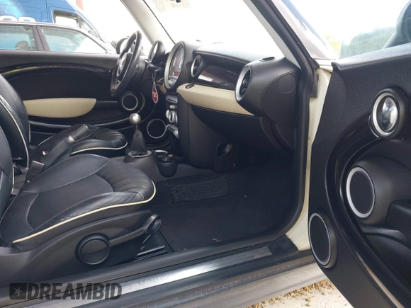 2007 MINI Hardtop with VIN WMWMF33557TL67653, listed as a IAAI auction lot 42581219 with 147,115 mi miles and . Bid and sale history available at DreamBid. Image 5.