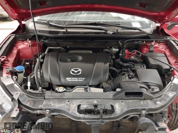 2016 Mazda CX-5 Grand Touring with VIN JM3KE4DY7G0731057, listed as a IAAI auction lot 41118072 with 134,107 mi miles and . Bid and sale history available at carsss.com. Image 10.