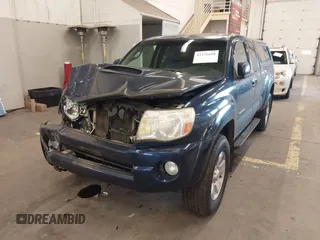 2006 Toyota Tacoma with VIN 5TEUU42N06Z265256, listed as a IAAI auction lot 41371660 with 153,557 mi miles. Bid and sale history available at carsss.com. Image 6.