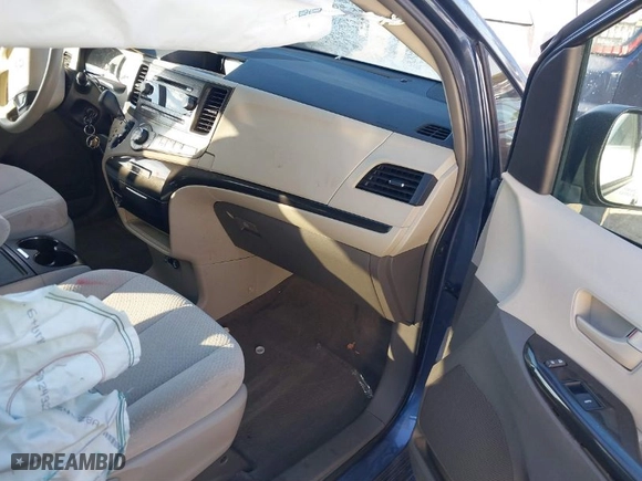 2014 Toyota Sienna LE AAS with VIN 5TDKK3DC8ES498784, listed as a IAAI auction lot 41399536 with 164,350 mi miles. Bid and sale history available at carsss.com. Image 5.