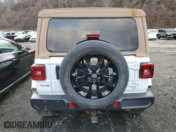 2021 Jeep Wrangler Unlimited Sahara с VIN 1C4JJXP62MW677073, выставлен на аукционе Copart как лот 61348075 с пробегом Не указан миль и Списание • Salvage title. История ставок и продаж доступна на DreamBid. Изображение 6.