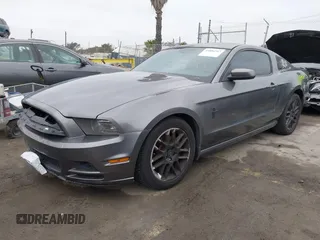2013 Ford Mustang V6 with VIN 1ZVBP8AM6D5241569, listed as a IAAI auction lot 41884583 with 100,700 mi miles. Bid and sale history available at carsss.com. Image 2.