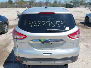 2013 Ford Escape SEL z VIN 1FMCU9H93DUA34811, wystawiony jako IAAI lot #42227559 z przebiegiem 126 495 mil mil oraz . Historia ofert i sprzedaży dostępna na DreamBid. Obrazek 17.