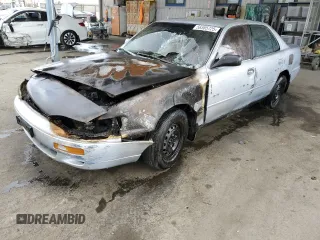 1995 Toyota Camry LE z VIN JT2SK12E0S0332923, wystawiony jako Copart lot #56565725 z przebiegiem Nie podano mil oraz Nie do naprawy • Non repairable. Historia ofert i sprzedaży dostępna na DreamBid. Obrazek 1.