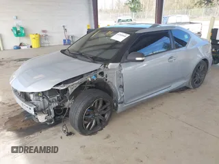 2014 Scion tC with VIN JTKJF5C71E3069593, listed as a IAAI auction lot 41901040 with 86,231 mi miles. Bid and sale history available at carsss.com. Image 17.