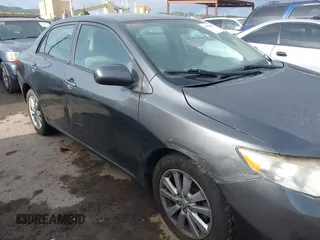 2009 Toyota Corolla with VIN 1NXBU40E79Z042778, listed as a IAAI auction lot 41928062 with 201,409 mi miles. Bid and sale history available at carsss.com. Image 6.