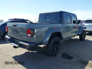 2022 Jeep Gladiator Texas Trail with VIN 1C6HJTAG5NL132990, listed as a IAAI auction lot 42514388 with 38,601 mi miles and . Bid and sale history available at DreamBid. Image 4.