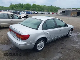 2002 Saturn SL z VIN 1G8ZK52762Z131497, wystawiony jako IAAI lot #42086108 z przebiegiem 119 273 mil mil oraz . Historia ofert i sprzedaży dostępna na DreamBid. Obrazek 4.