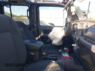 2022 Jeep Wrangler Unlimited Sport with VIN 1C4HJXDNXNW112324, listed as a IAAI auction lot 41376149 with 69,435 mi miles and . Bid and sale history available at DreamBid. Image 5.